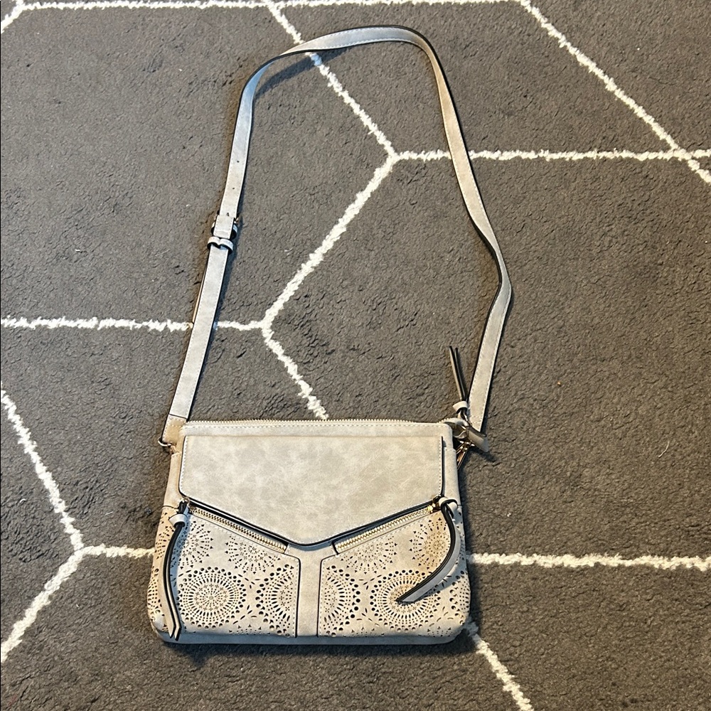Like new Chic Beige Crossbody Bag with Intricate Design